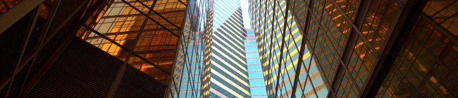 Co-Investments - banner image -Upward view of city buildings